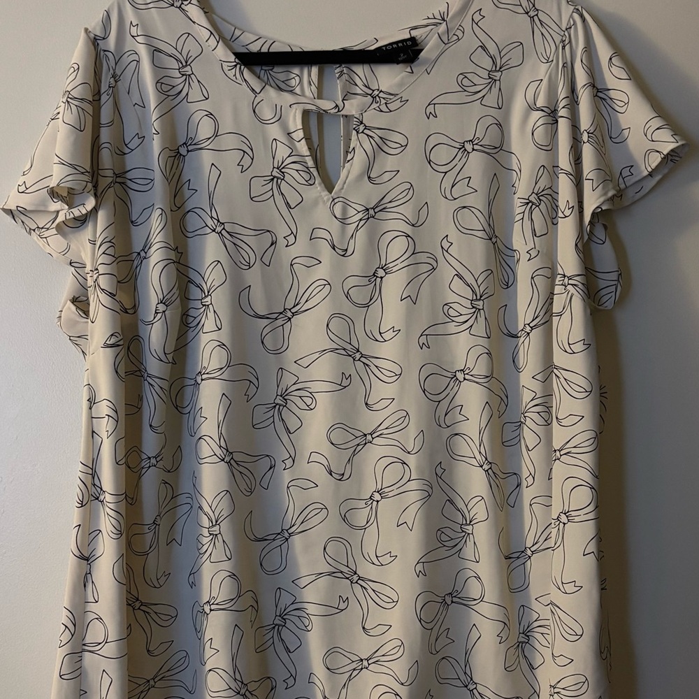 Torrid Cream and Black Bow Print Blouse